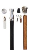 An Edwardian silver mounted ebonised wood system walking stick, the waisted grip hallmarked for