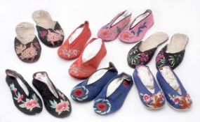 A collection of seven Chinese silk slippers, 19th century, delicately embroidered with auspicious