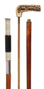 A metal mounted malacca system stick, second quarter 20th century, the cylindrical ebonised metal