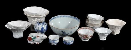 A collection of ten Chinese blanc de Chine libation cups of various sizes decorated with the Eight