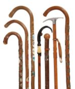 An Alpine metal mounted stained hardwood system walking stick, second quarter 20th century, the