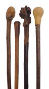 A stained hardwood, possibly Scottish laburnum walking stick, late 19th century, the tapering grip