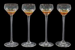 Five Art Nouveau liquour glasses by Theresienthal, circa 1910, in clear glass enamelled with flower