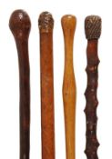 A lacquered fruitwood and canvas bound stave or ?dandy?s stick?, 19th century, the grip and shaft