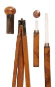 A stained beech and brass mounted photographer?s system walking stick, circa 1915, the bun grip