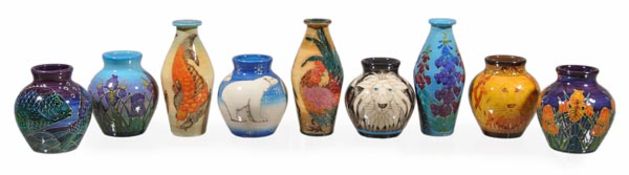 Sally Tuffin for Dennis China Works, nine small vases, of differing designs and nos., impressed and