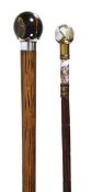 A porcelain and gilt metal mounted bamboo walking stick, probably French, early 20th century, the