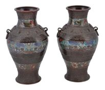 A pair of Chinese bronze enamel vases of archaistic shape decorated in enamel and cast bands of