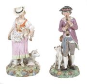 A pair of Royal Copenhagen models of a shepherd and companion, circa 1900, 19cm high, printed and