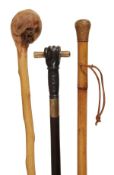 A Victorian bamboo and cordwork system stick, late 19th century, the weighted shaft with a