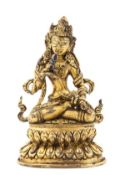 A gilt bronze figure of Vajrasattva, 18th century or earlier, finely cast, seated in dhyanasana on