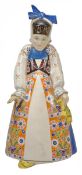 A Lenci pottery large figure of a peasant woman, standing with hunched shoulders and wearing a
