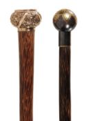 A fine Damascened steel mounted palmwood walking stick, probably Spanish, early 20th century, the