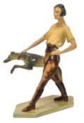 A Wade Art Deco figure of Christina, 1930s, restraining her greyhound, on a canted-rectangular