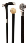 A white metal mounted stained hardwood walking stick, second half 20th century, the lobed spherical