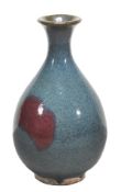 A Chinese jun-style vase of pear shaped body, 21.5cm high, 20th century