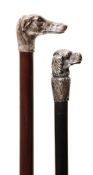 Two silver plated metal mounted walking sticks with grips cast as hound?s heads, one with ebony