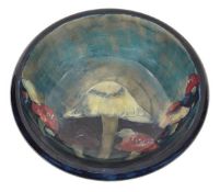 Claremont, a large Moorcroft bowl, mushrooms on a shaded bluey green ground, the exterior deep