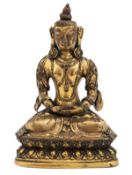 A Tibetan gilded copper repousse? figure of Amitayus, 18th century, seated in dhyanasana on a