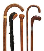 A Victorian poker-worked hardwood walking stick, late 19th century, with integral crook grip, 90cm