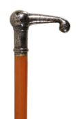 A fine niello worked white metal mounted malacca walking stick, probably south Russia/Caucasus,