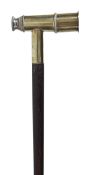 A brass mounted stained hardwood system walking stick, circa 1925, the grip as a four-draw