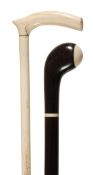 A Victorian marine ivory mounted whalebone walking stick, third quarter 19th century, the