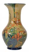 Wandbord, a Moorcroft baluster vase, impressed and painted marks, signed by Nicola Slaney,