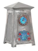 Archibald Knox for Liberty & Co., an English Pewter and enamel clock, model no. 0629, with a