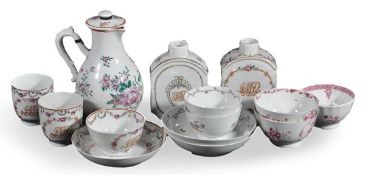 A selection of Chinese famille rose armorial porcelain wares including five tea bowls, two saucer