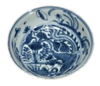 A Chinese blue and white ?phoenyx? bowl with flaring rim decorated with scrolling leaves and lotus