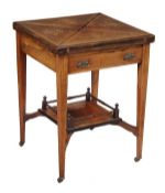 A Victorian rosewood and marquetry decorated envelope card table, circa 1890, opening to a green