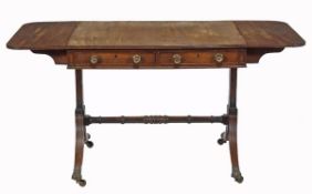 A Regency mahogany sofa table, circa 1815, the hinged rectangular top above two frieze drawers and