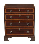 A George III mahogany and satinwood crossbanded chest of drawers, circa 1800, of small