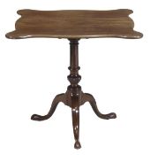 A George III mahogany tripod table, circa 1780, the tilt top with outset corners, on a turned and