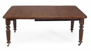 A Victorian mahogany extending dining table, circa 1860, the rectangular top with moulded edge above