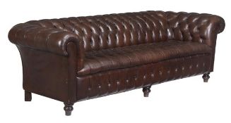 A brown leather upholstered Chesterfield sofa in Victorian style, 20th century, with button back