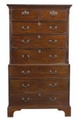 A George III mahogany chest on chest, circa 1780, with a moulded cornice above two short and six