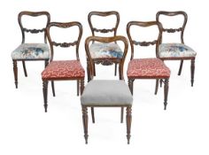 A set of six William IV rosewood and parcel gilt dining chairs, circa 1835, each moulded cartouche