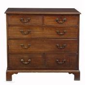 A George III mahogany chest of drawers, circa 1780, with a moulded rectangular top above two short