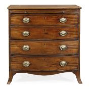 A George III mahogany bowfront chest with a brushing slide above four long graduated drawers and