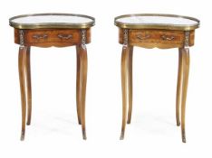 A pair of French kingwood, marble and gilt metal mounted kidney shaped side tables, of recent