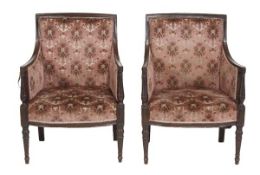 A pair of mahogany and upholstered armchairs, late 19th/early 20th century, each with rectangular