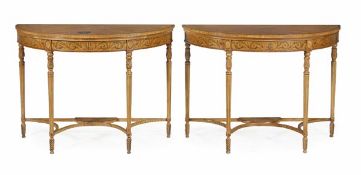 A pair of satinwood, tulipwood, marquetry and painted semi elliptical side tables in George III