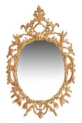 A pair of giltwood framed wall mirrors in George III style, of recent manufacture, each with oval
