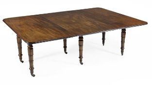 A George IV mahogany dining table, circa 1825, with one additional leave, the rectangular top with