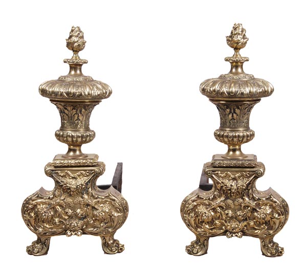 A pair of polished brass and wrought iron mounted fire dogs in Louis XIV taste, late 19th century,