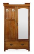 A walnut and metal marquetry decorated wardrobe, in the manner of Shapland and Petter, circa 1900,