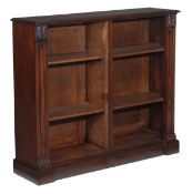 A William IV mahogany open bookcase, circa 1835, with open shelves and lappet carved terminals,
