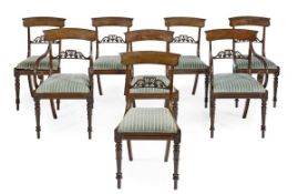 A set of eight George IV mahogany dining chairs, circa 1825, including a pair of armchairs, each